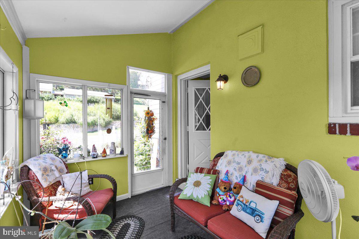 1717 Friedensburg Road Reading, PA 19606 - Photo 32 of 63 a living room with furniture and a large window