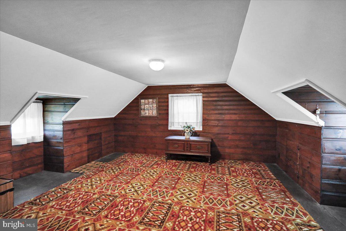 1717 Friedensburg Road Reading, PA 19606 - Photo 33 of 63 a hallway with a bed and a dresser