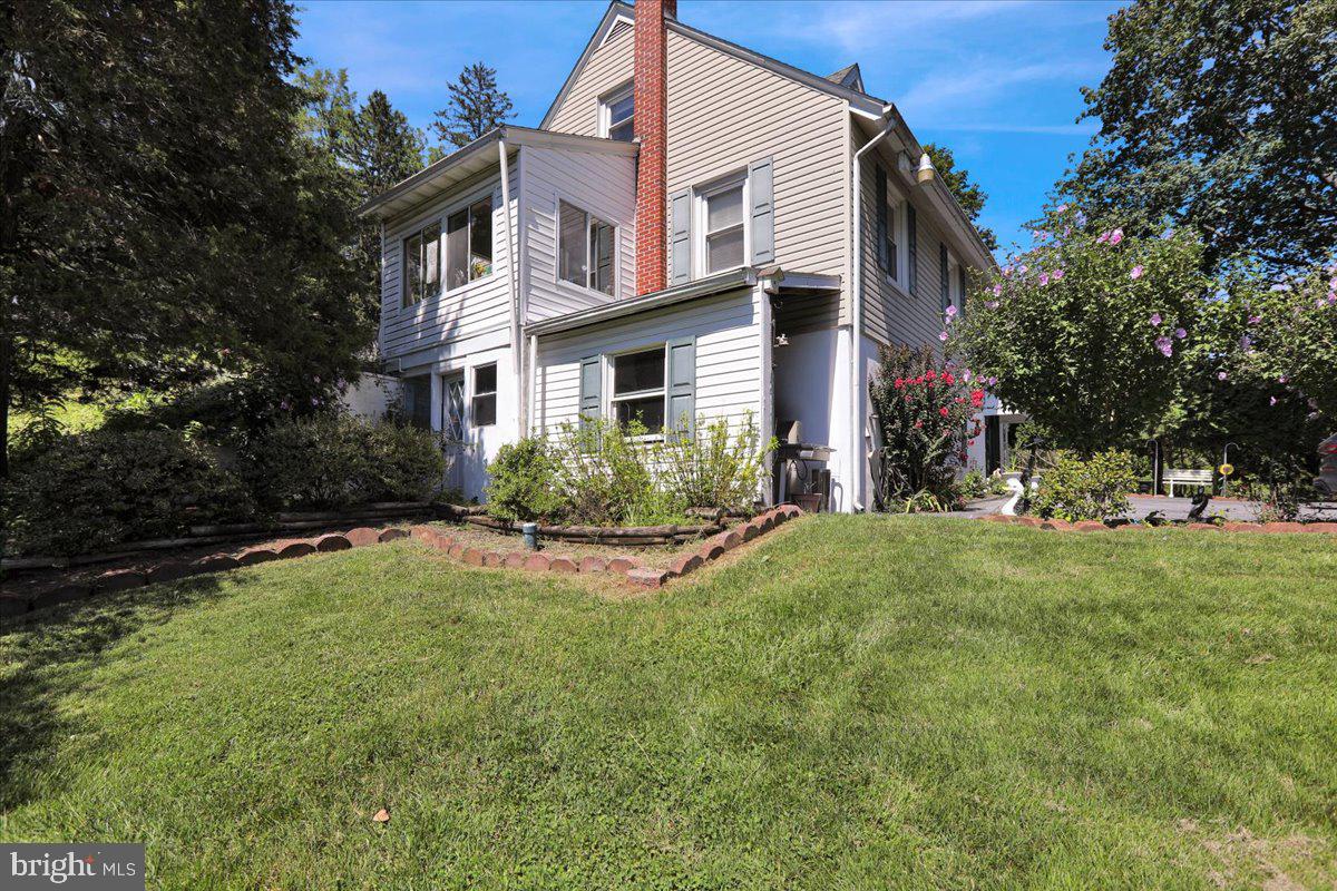 1717 Friedensburg Road Reading, PA 19606 - Photo 40 of 63 a view of a house with a yard and plants