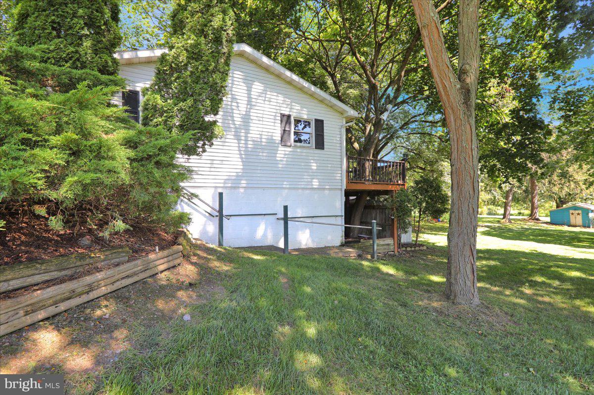 1717 Friedensburg Road Reading, PA 19606 - Photo 41 of 63 a view of a house with backyard and a tree
