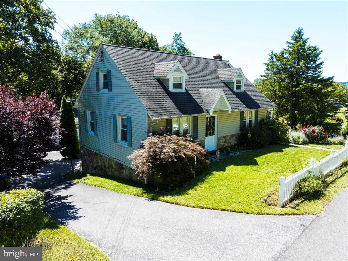 1717 Friedensburg Road Reading, PA 19606 - Photo 49 of 63 a view of a house with a swimming pool and a yard