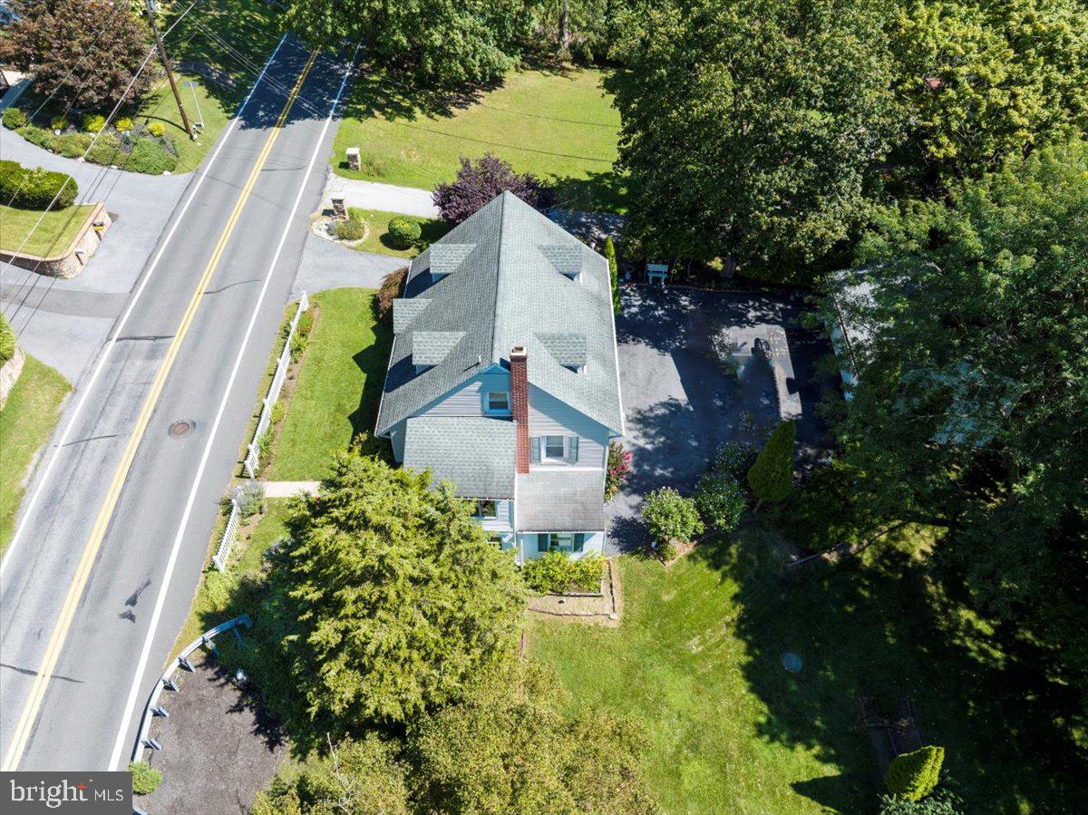 1717 Friedensburg Road Reading, PA 19606 - Photo 53 of 63 a aerial view of a house with swimming pool and garden