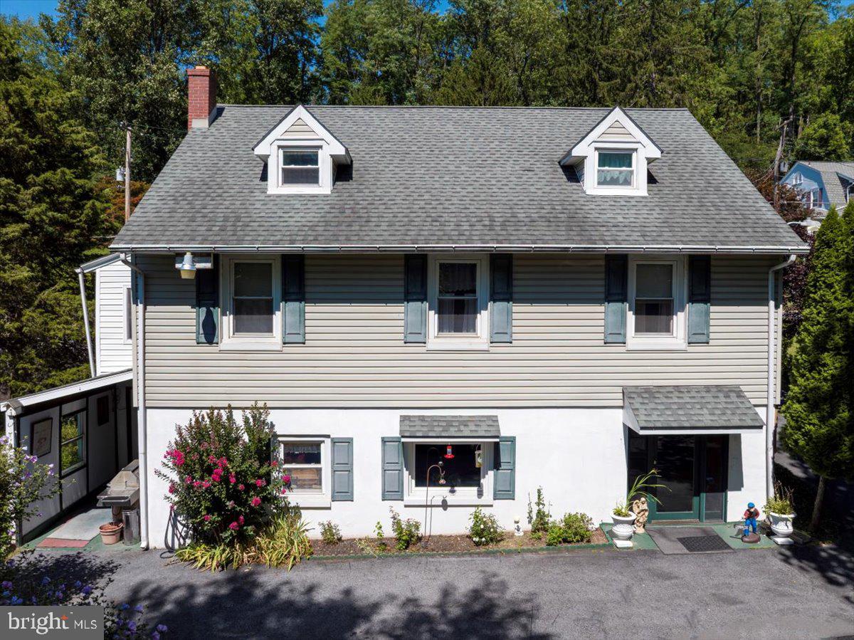 1717 Friedensburg Road Reading, PA 19606 - Photo 55 of 63 a front view of a house with a yard