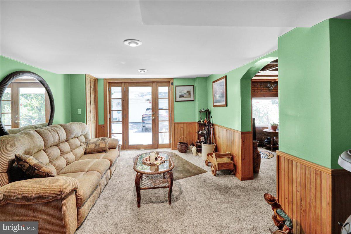 1717 Friedensburg Road Reading, PA 19606 - Photo 6 of 63 a living room with furniture and a large window