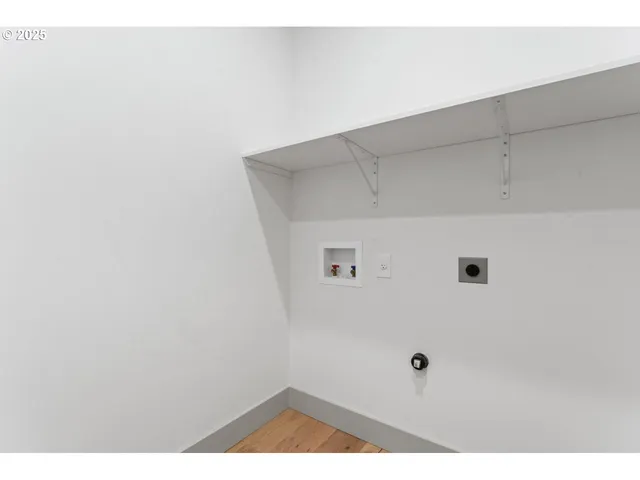 a bathroom with a granite countertop sink toilet a mirror and a shower