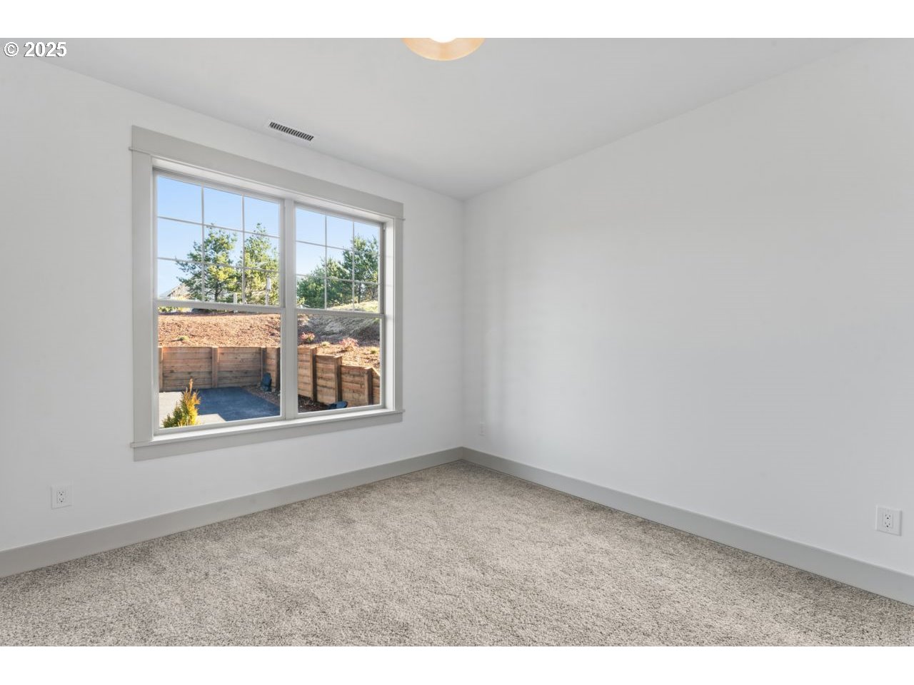 5216 Dunewood Drive Florence, OR 97439 - Photo 31 of 46 a view of an empty room with a window