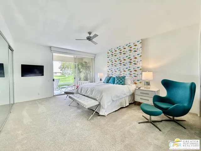 a outdoor space with lots of tables and chairs