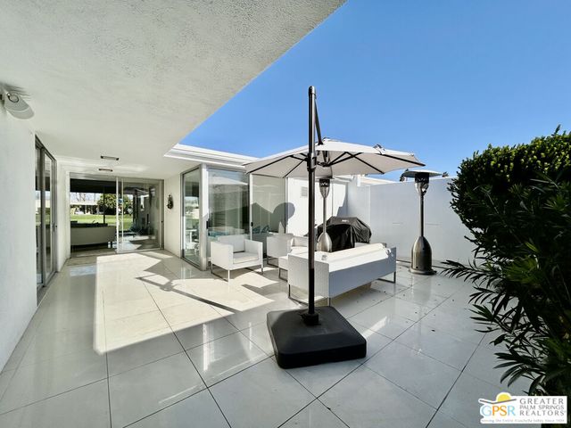 a room with furniture and a wooden floor