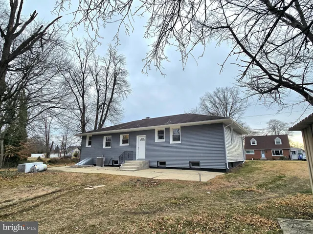 a house view with a backyard space