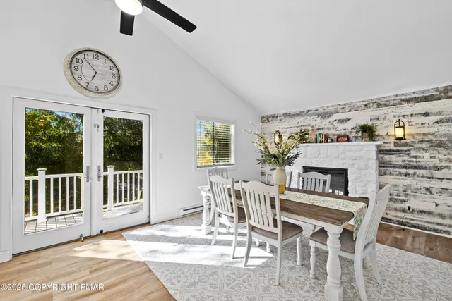 a view of a dining room with furniture window and outside view