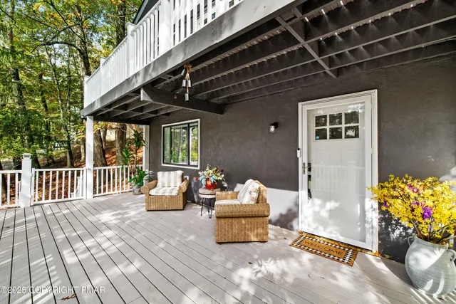 a outdoor space with lots of potted plants