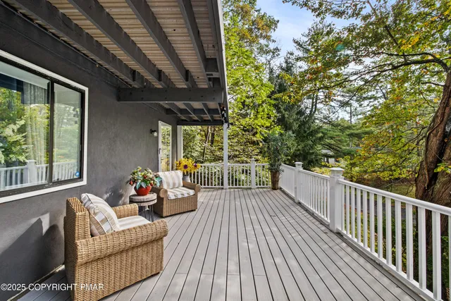 a view of a couches in the balcony