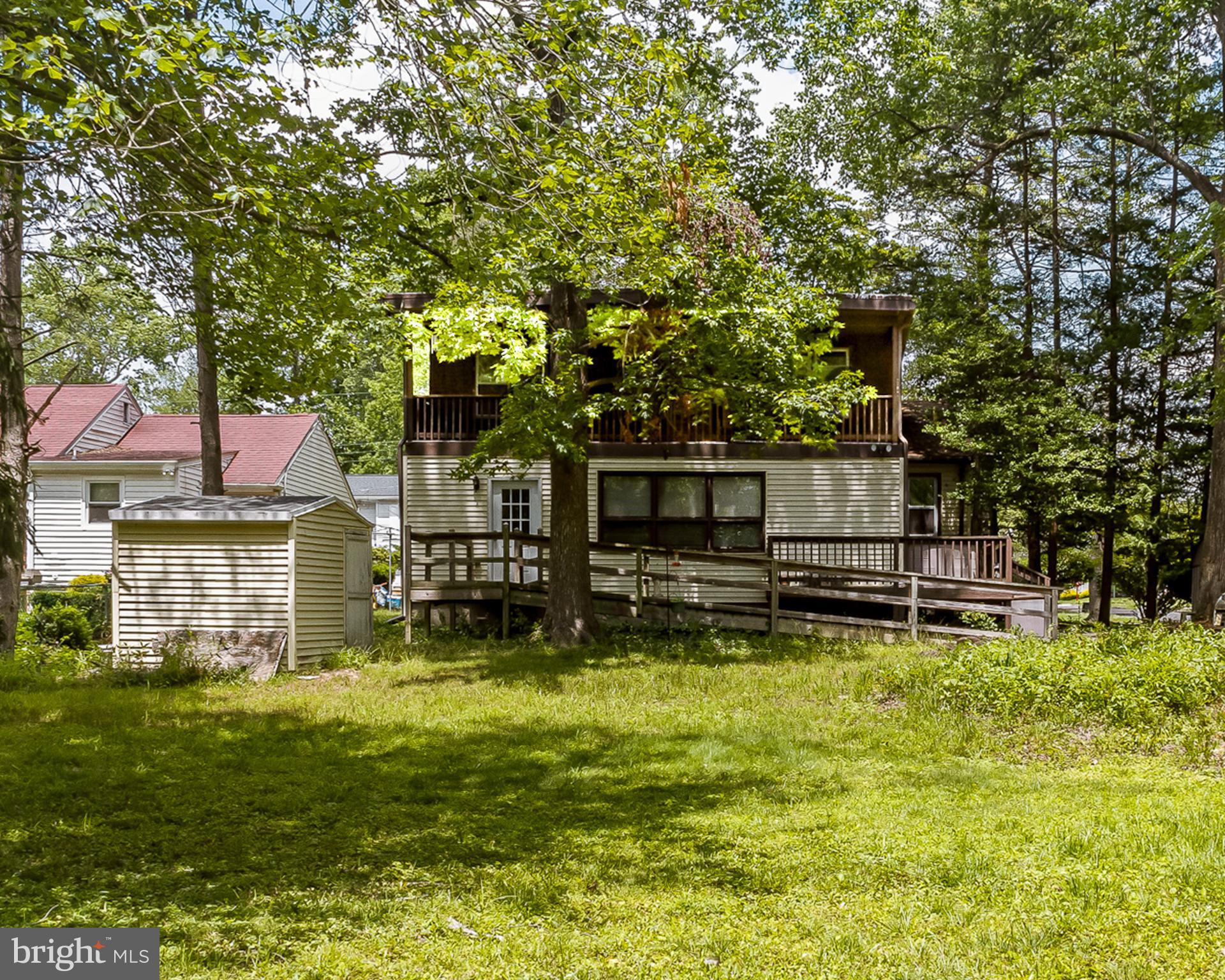 41 Spring Lake Drive Clementon, NJ 08021 - Photo 28 of 30 a swimming pool with outdoor seating and yard