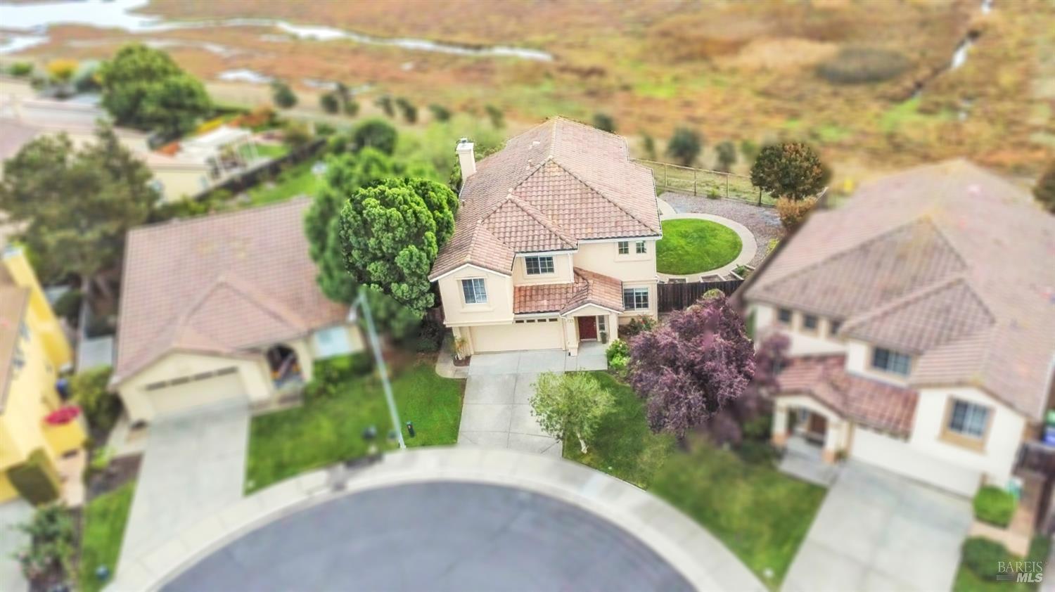 9 Regatta Way Napa, CA 94559 - Photo 1 of 20 a aerial view of a house with a yard and garage