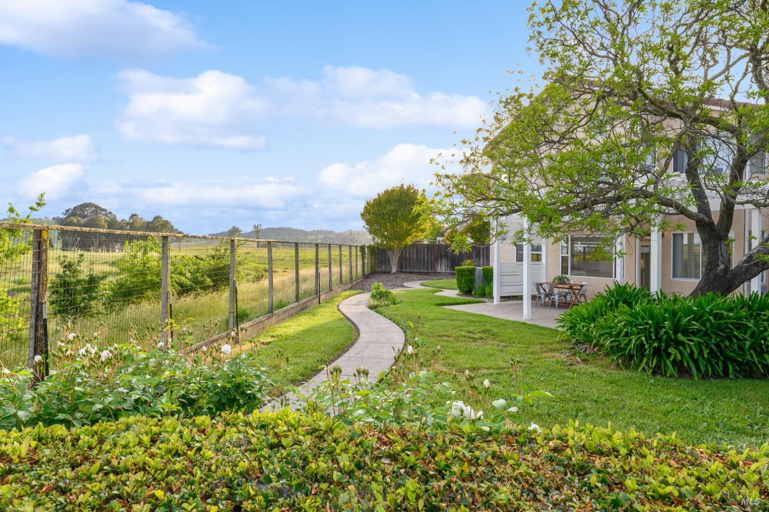 9 Regatta Way Napa, CA 94559 - Photo 15 of 20 a view of a swimming pool with a garden