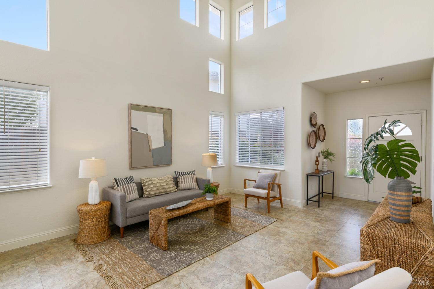 9 Regatta Way Napa, CA 94559 - Photo 3 of 20 a living room with furniture potted plant and windows