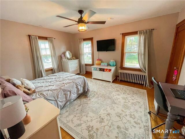 16 Meriden Avenue Meriden, CT 06451 - Photo 15 of 29 a bedroom with a bed window and a flat screen tv