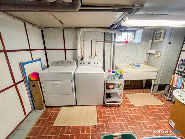 16 Meriden Avenue Meriden, CT 06451 - Photo 21 of 29 a utility room with dryer and washer
