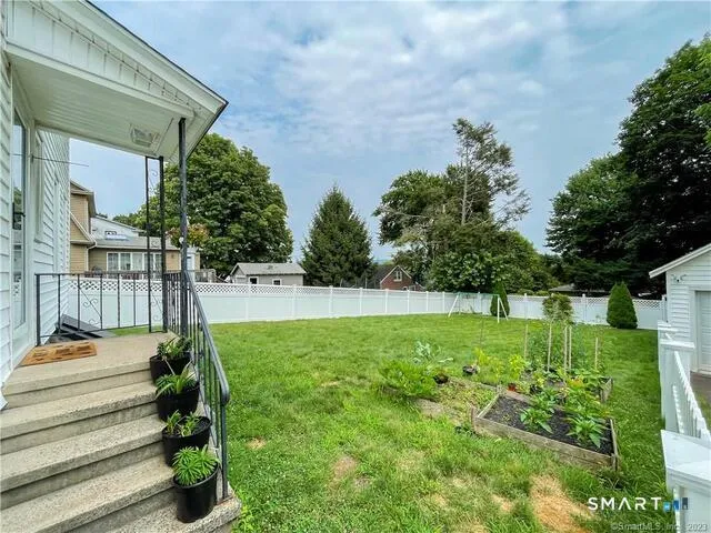 a house view with a garden space