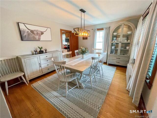 16 Meriden Avenue Meriden, CT 06451 - Photo 8 of 29 a view of a dining room with furniture window and wooden floor