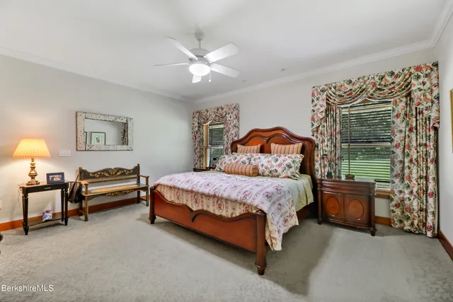 a spacious bathroom with a large tub and shower