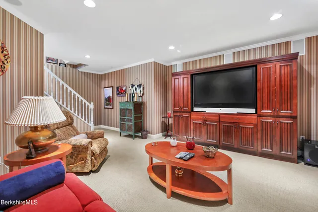 a bedroom with furniture and a bed