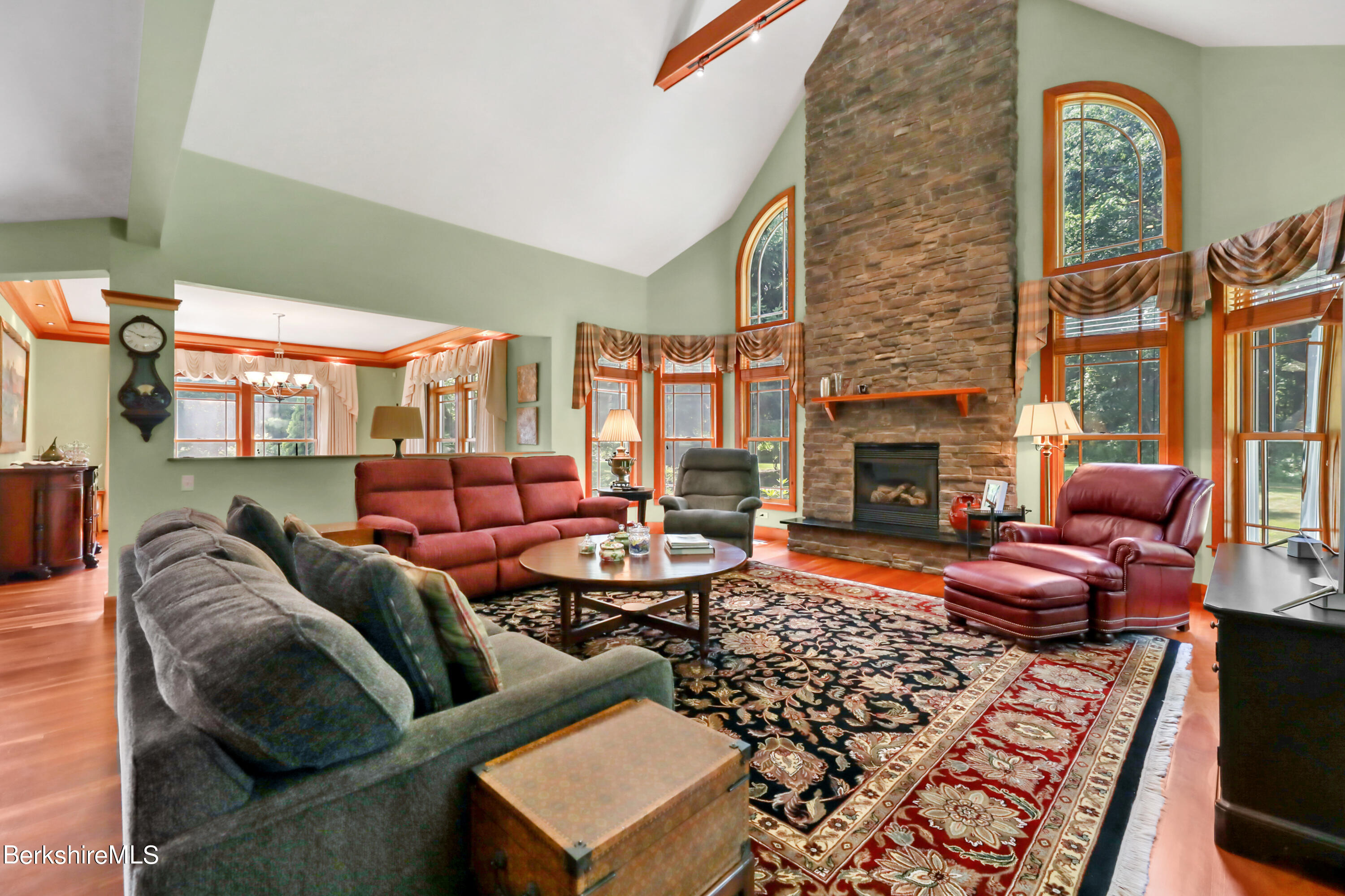 82 Stockbridge Terrace, Unit 82 Lee, MA 01238 - Photo 4 of 64 a living room with furniture and a fireplace