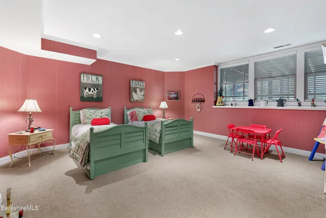 a view of a terrace with a table and chairs