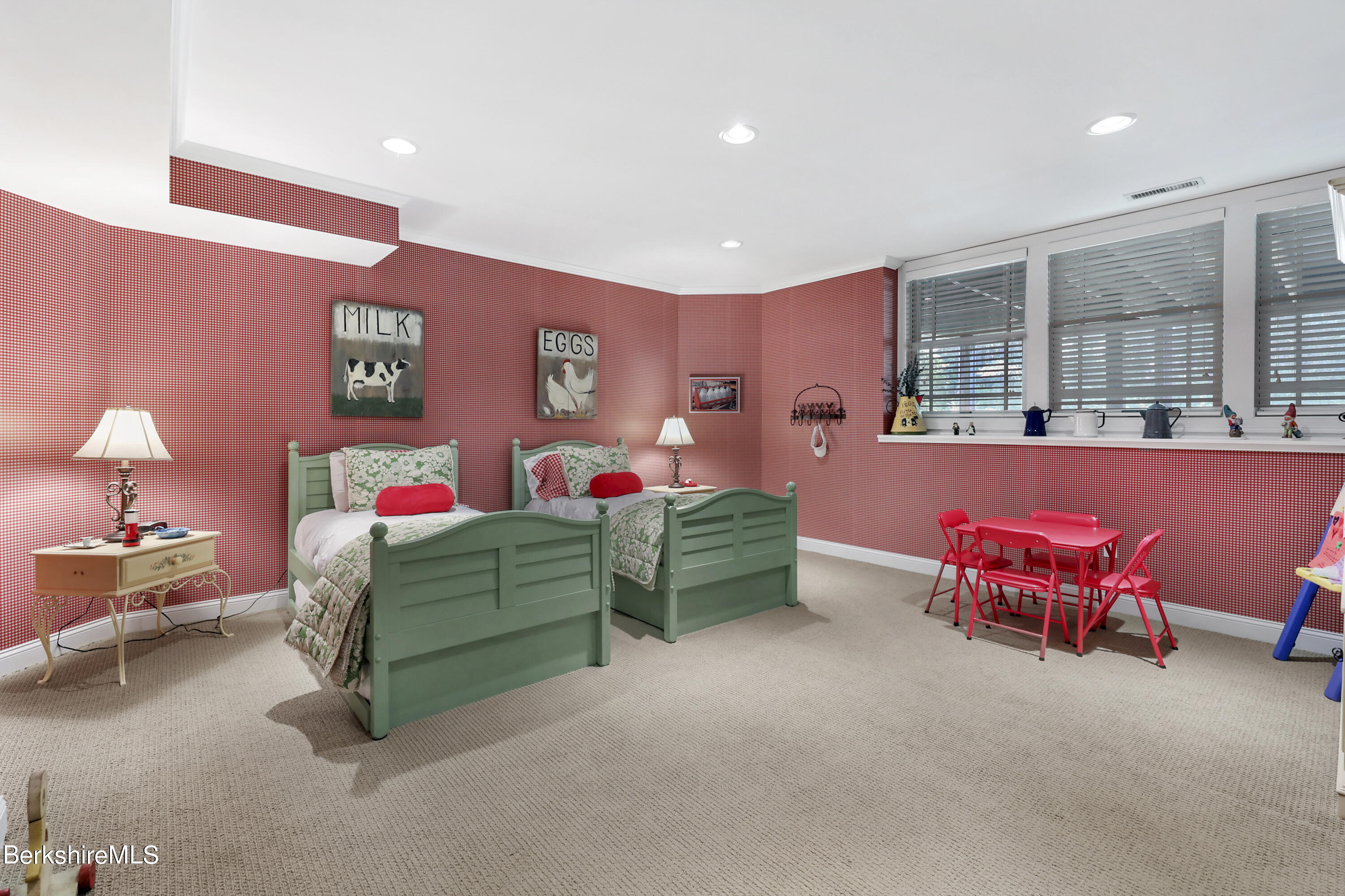 82 Stockbridge Terrace, Unit 82 Lee, MA 01238 - Photo 46 of 64 a bedroom with furniture and a bed