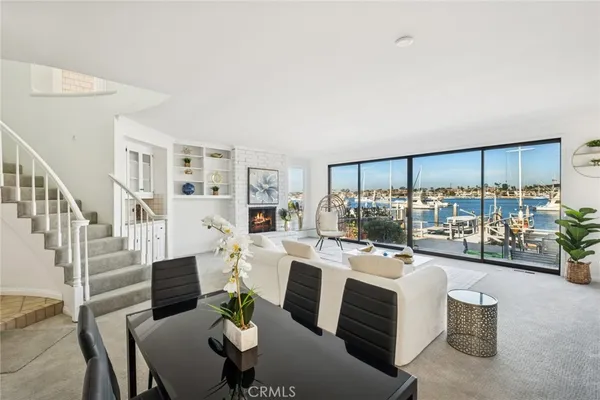 a room with lots of table and chairs