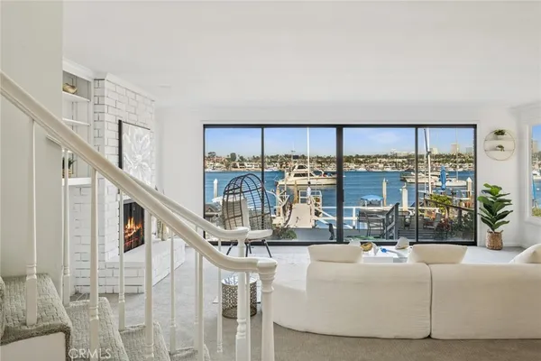 a kitchen with granite countertop a stove sink and cabinets