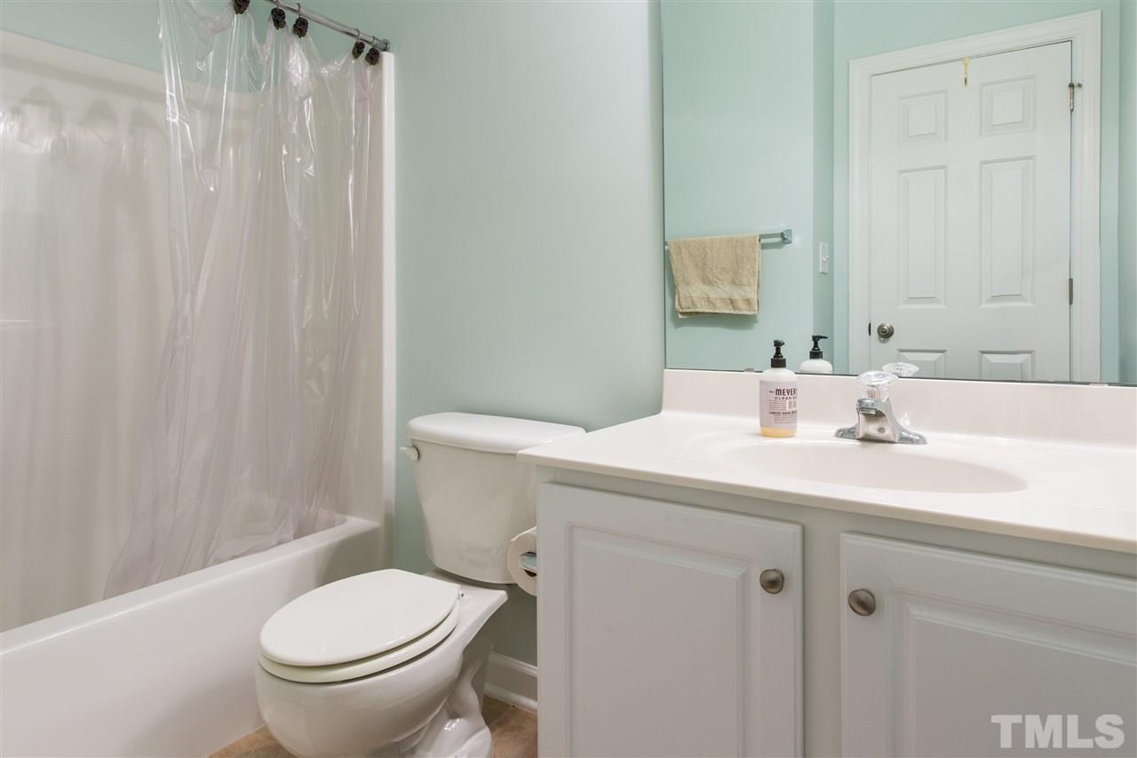3517 Edgemont Drive Raleigh, NC 27612 - Photo 20 of 25 a bathroom with a sink a toilet and shower