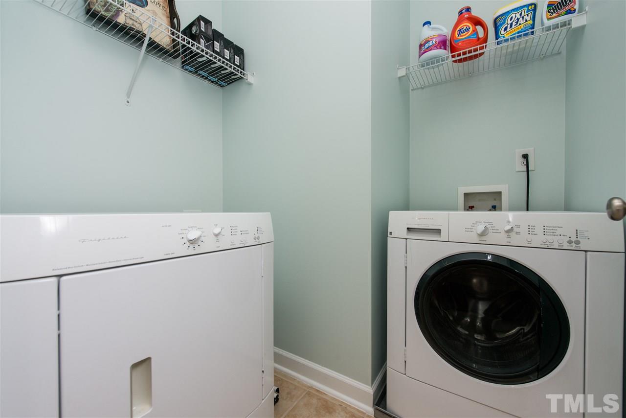3517 Edgemont Drive Raleigh, NC 27612 - Photo 22 of 25 a utility room with dryer and washer