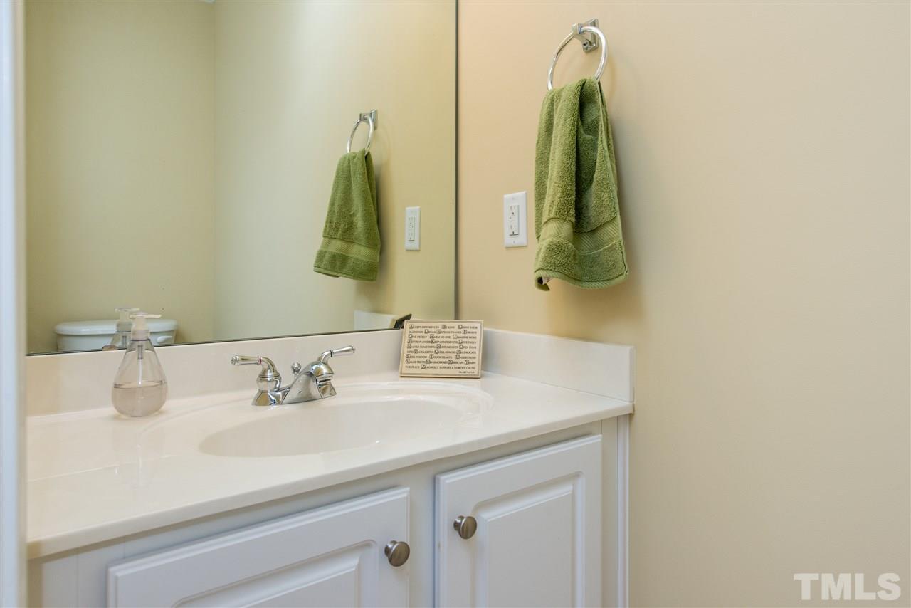 3517 Edgemont Drive Raleigh, NC 27612 - Photo 5 of 25 a bathroom with a sink and vanity