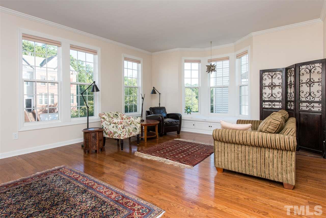 3517 Edgemont Drive Raleigh, NC 27612 - Photo 7 of 25 a living room with furniture and a large window