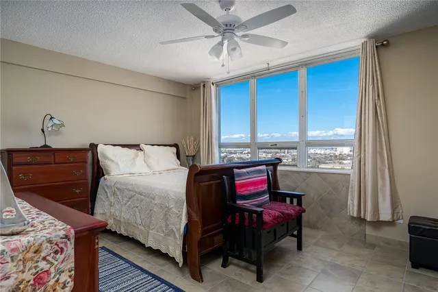 a bedroom with a bed and furniture