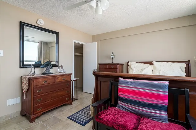 a room with a dresser and a mirror