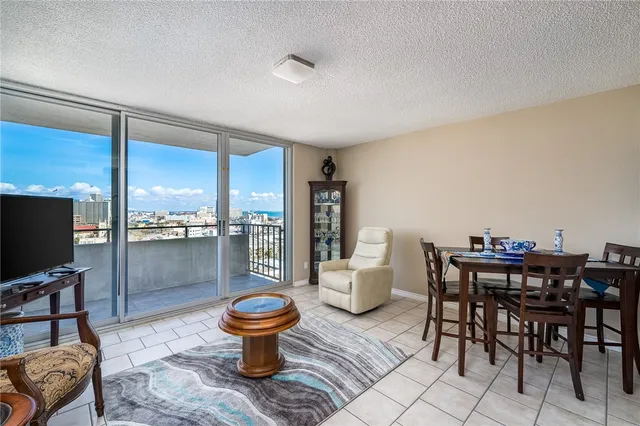a dining room with a table and chairs