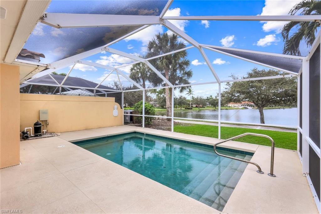 3748 Exuma Way Naples, FL 34119 - Photo 42 of 50 Outdoor pool featuring a patio, a west facing water view, a screened lanai to experience the gorgeous pink sunsets of Naples.