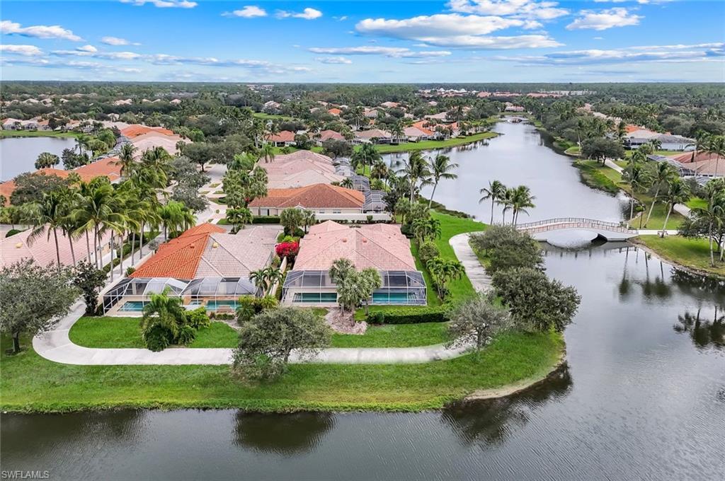 3748 Exuma Way Naples, FL 34119 - Photo 43 of 50 Aerial perspective of the rear of the property with the serene views