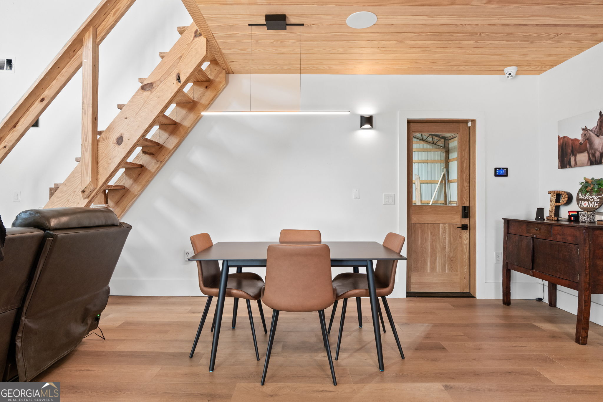 1140 City Pond Road Barnesville, GA 30204 - Photo 13 of 37 a view of a dining room with furniture and wooden floor
