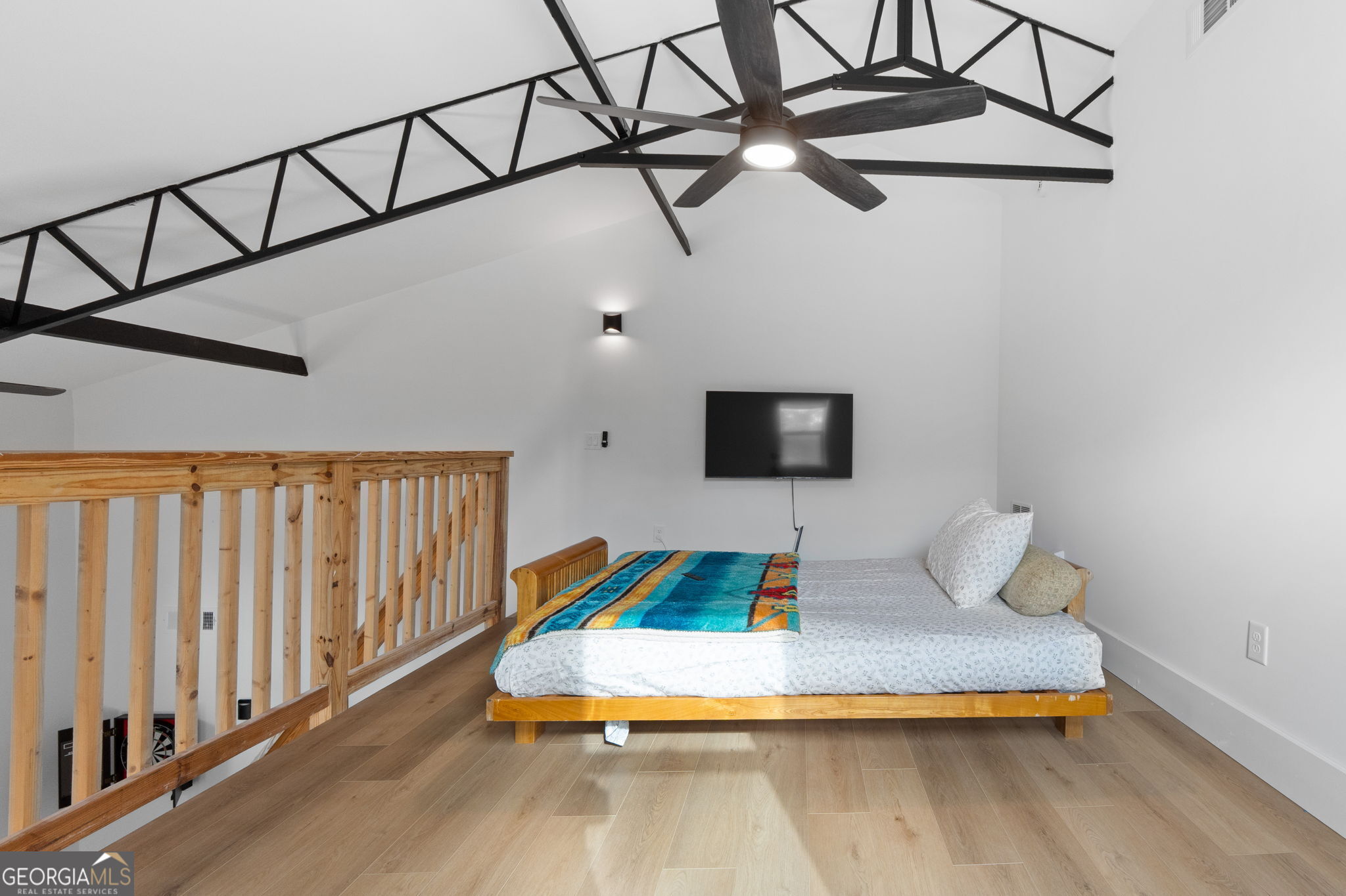 1140 City Pond Road Barnesville, GA 30204 - Photo 22 of 37 a bedroom with bunk bed and a flat screen tv