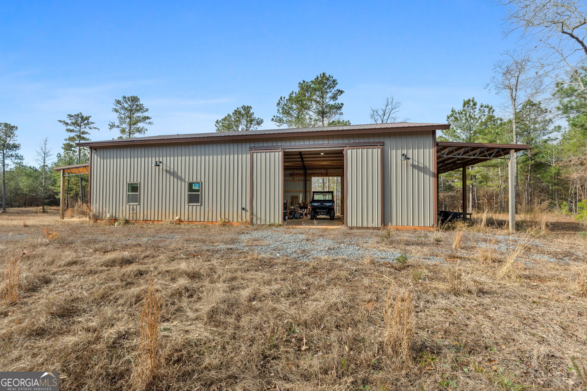 1140 City Pond Road Barnesville, GA 30204 - Photo 27 of 37 front view of a house with a yard