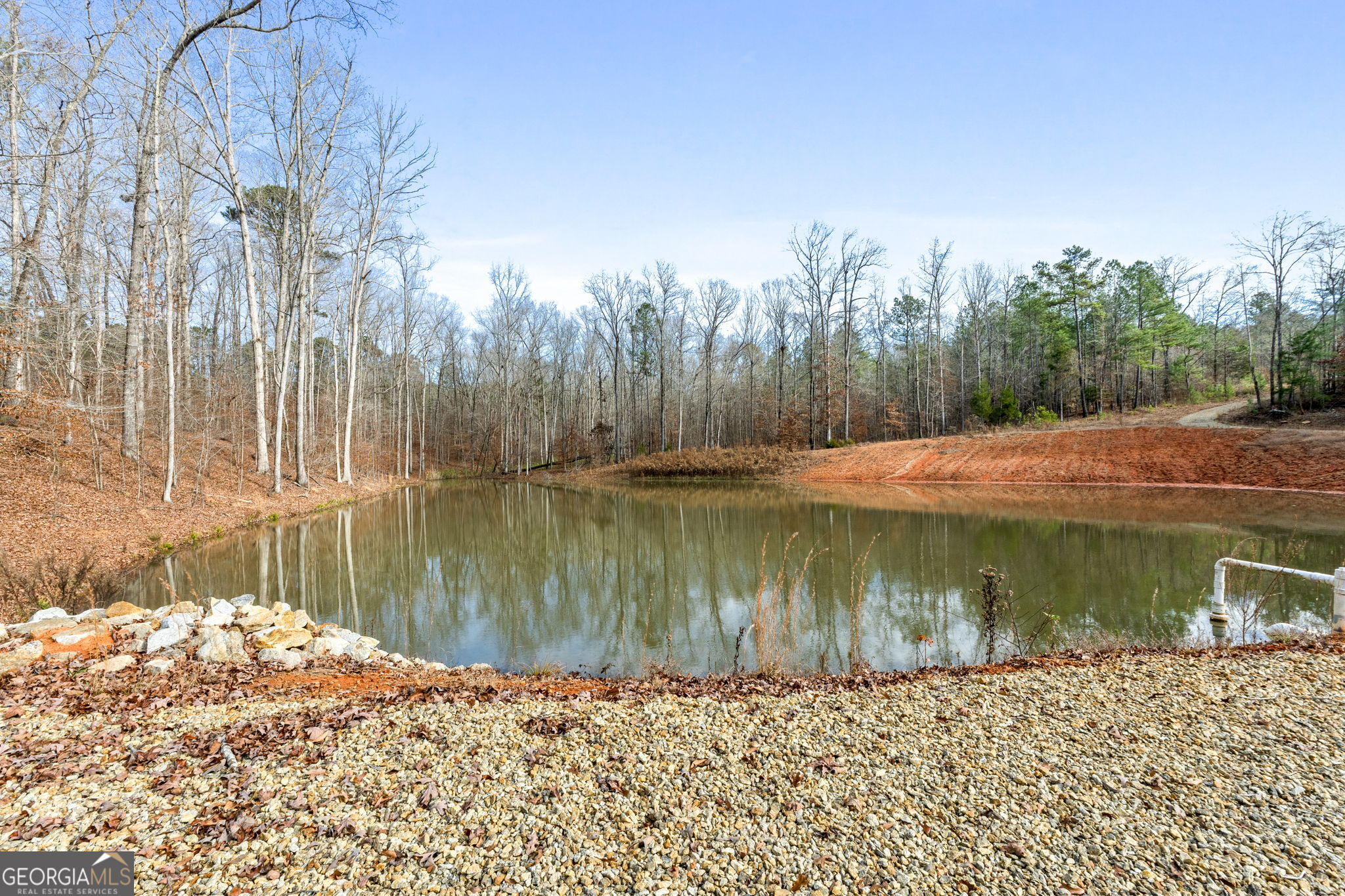 1140 City Pond Road Barnesville, GA 30204 - Photo 30 of 37 a view of lake with a yard