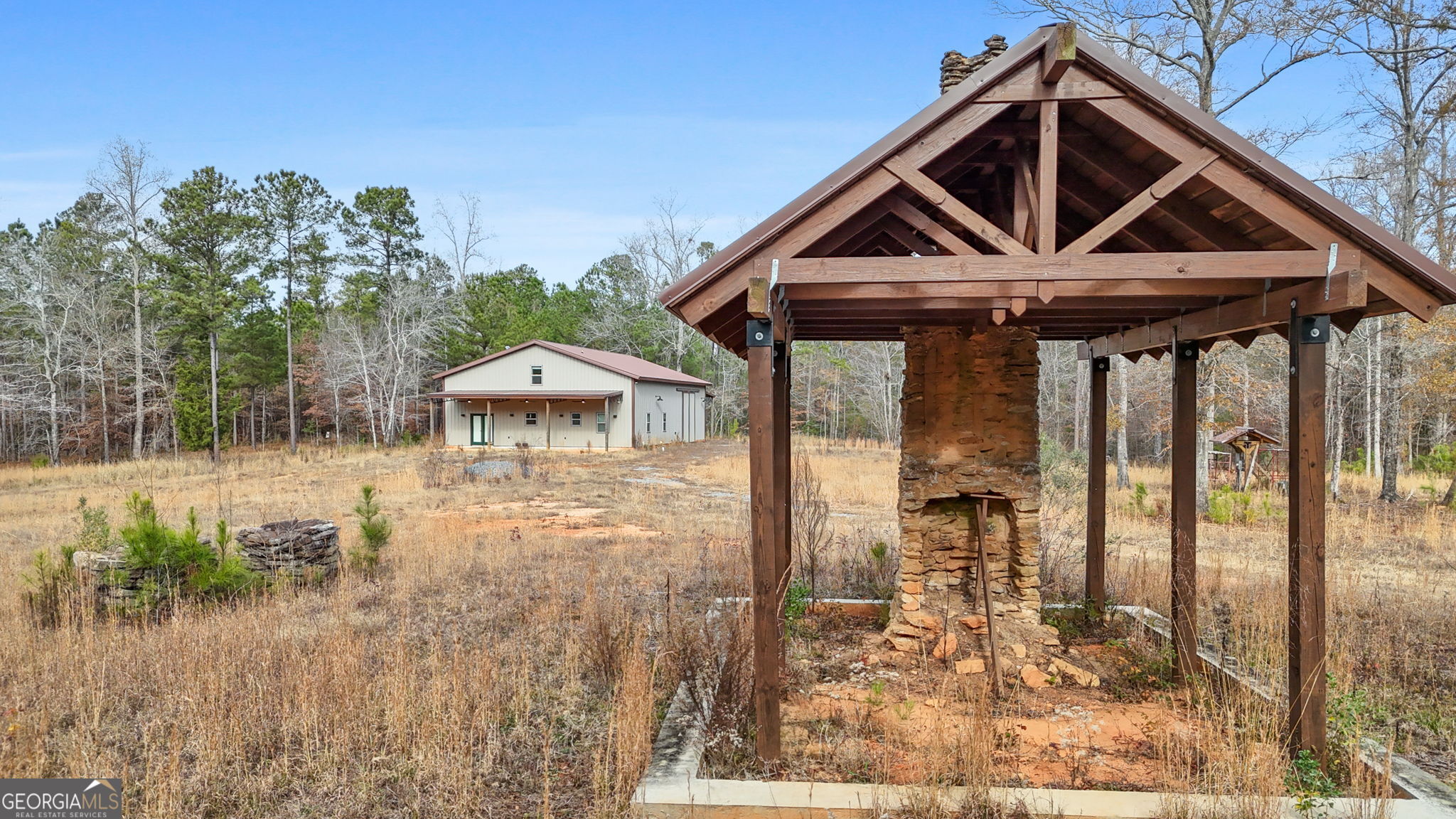 1140 City Pond Road Barnesville, GA 30204 - Photo 5 of 37 a front view of a house with a yard