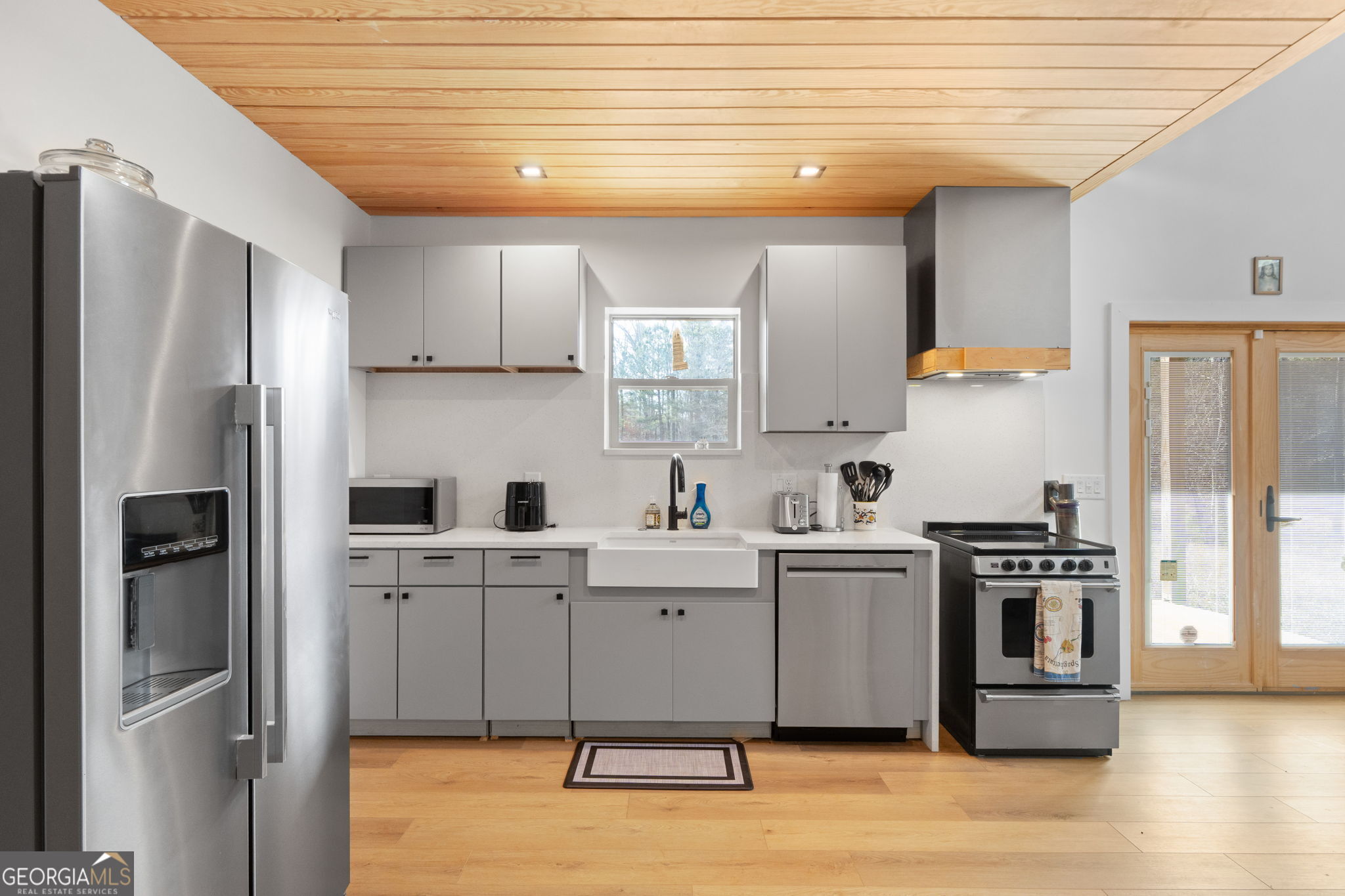 1140 City Pond Road Barnesville, GA 30204 - Photo 8 of 37 a kitchen with stainless steel appliances granite countertop a refrigerator a stove and a sink