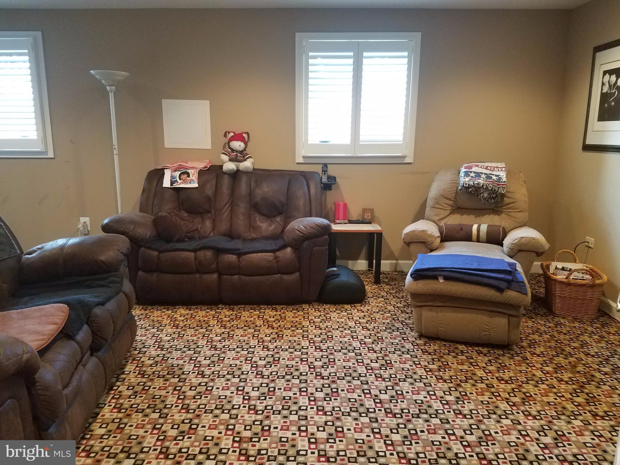 6901 Friendship Road Clinton, MD 20735 - Photo 22 of 26 a living room with furniture and a window