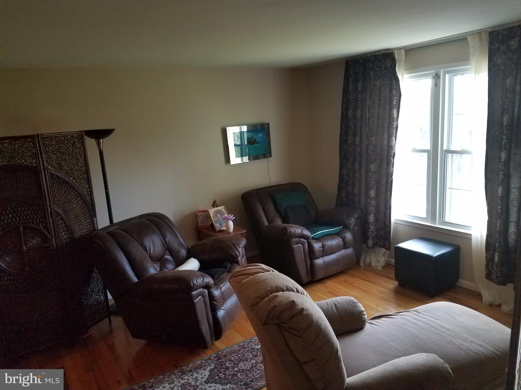 6901 Friendship Road Clinton, MD 20735 - Photo 4 of 26 a living room with furniture a window and a couch