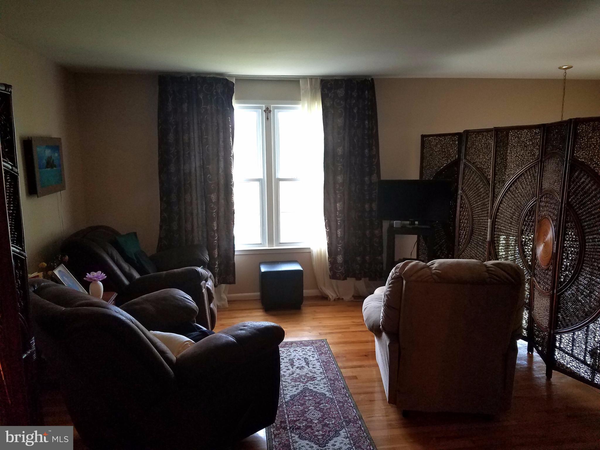 6901 Friendship Road Clinton, MD 20735 - Photo 5 of 26 a living room with furniture and a window
