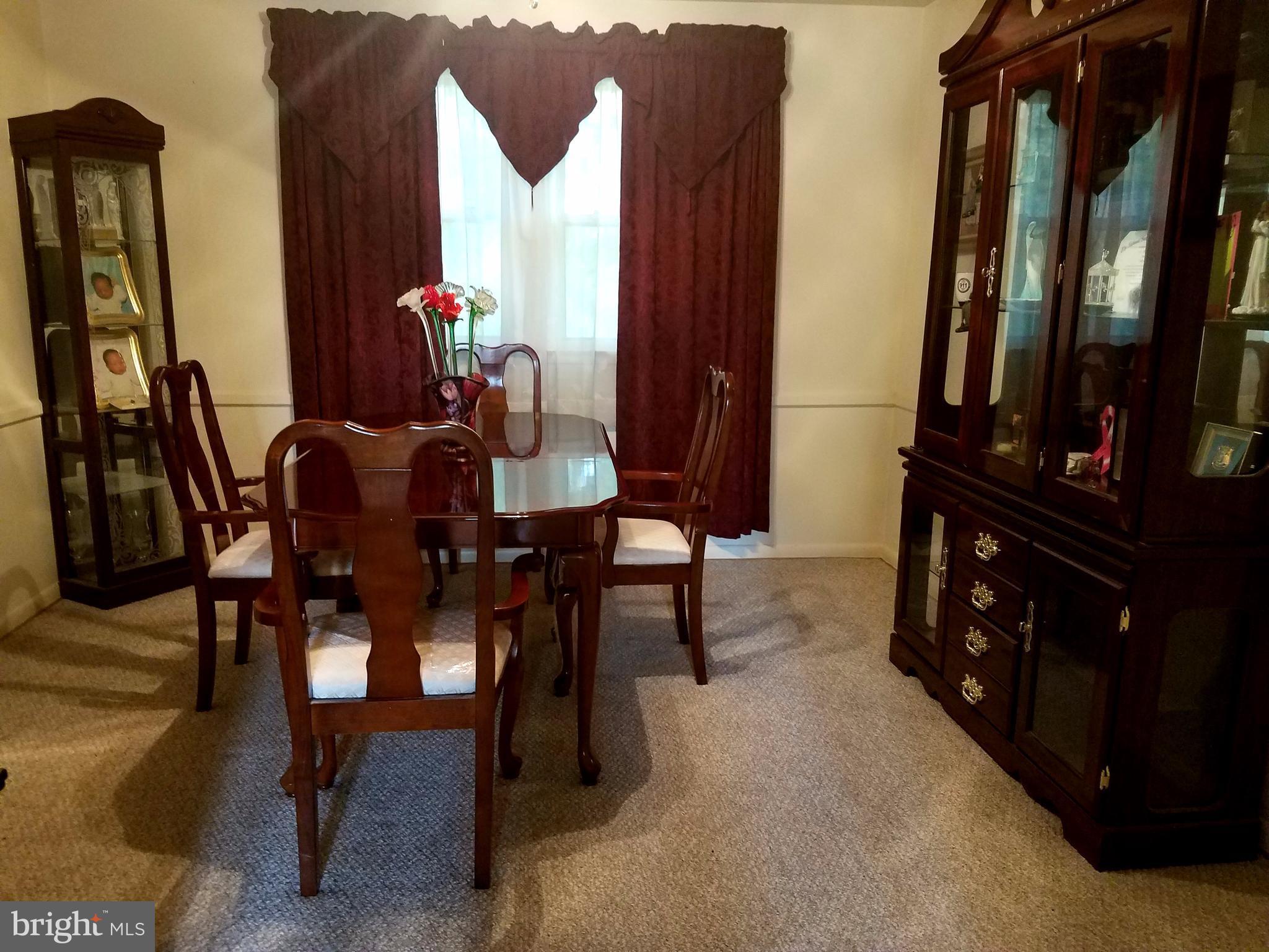 6901 Friendship Road Clinton, MD 20735 - Photo 7 of 26 a dining room with furniture and window